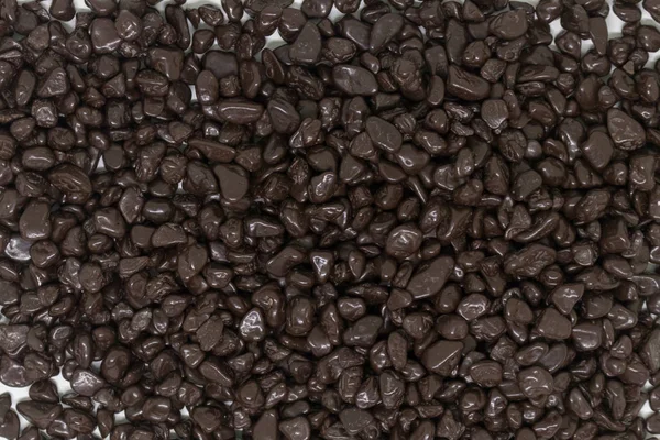 Chocolate negro confitería en dragee espolvoreado con una capa lisa — Foto de Stock