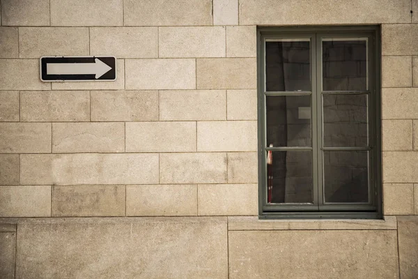 Red brick wall with a window — Stock Photo, Image