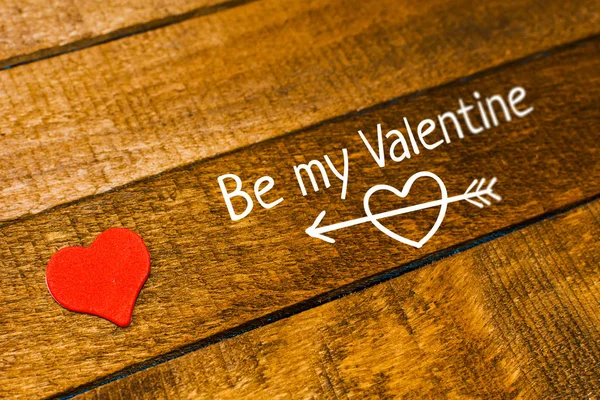 O cartão do Dia dos Namorados. pequeno coração vermelho com a inscrição Vale — Fotografia de Stock