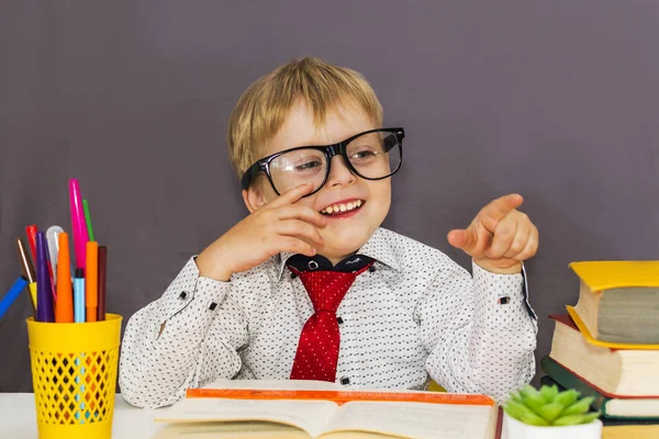 Smart Funny Boy Glasses Table Books Gray Background — Stock Photo, Image