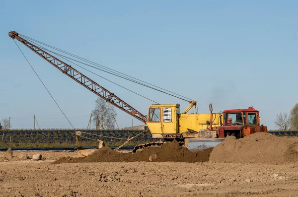 Traktor och grävmaskin — Stockfoto