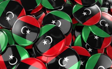 Libya rozetleri arka plan - Libya bayrağı düğmeleri yığını.