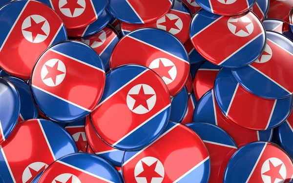 Distintivi Corea del Nord sfondo - Mucchio del pulsante Bandiera nordcoreana — Foto Stock