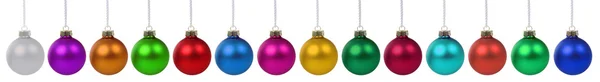 Bolas de Natal baubles muitos colorido decoração em uma fileira isolat — Fotografia de Stock