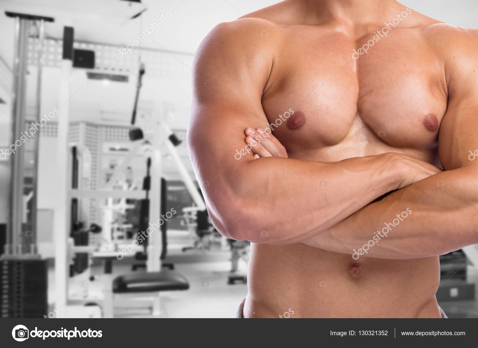 Bodybuilder bodybuilding flexing chest muscles posing fitness gy Stock  Photo by ©Boarding2Now 130321352