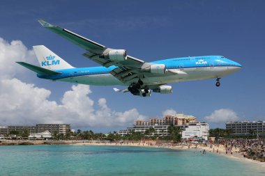 KLM Boeing 747-400 airplane landing St. Martin airport clipart
