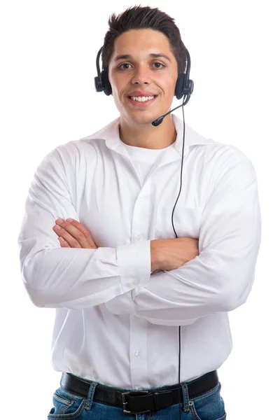 Młody człowiek uśmiechający się z zestawu słuchawkowego telefon telefon center agent — Zdjęcie stockowe