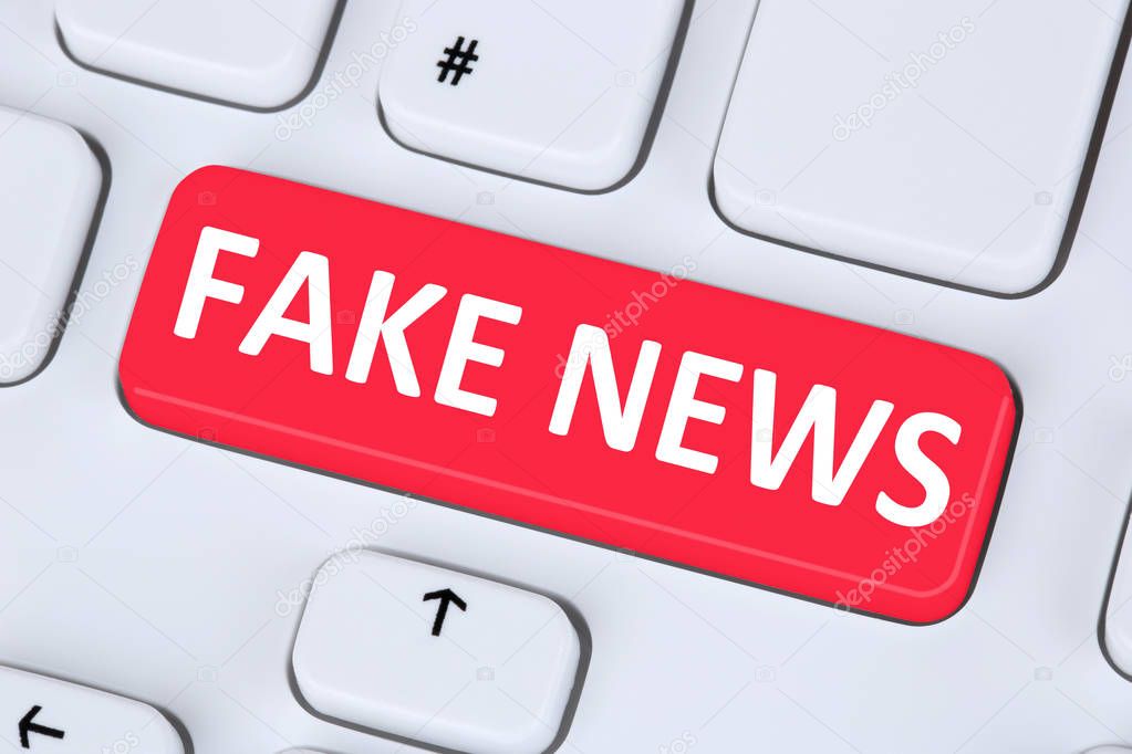 Fake news truth lie media internet button online computer keyboa