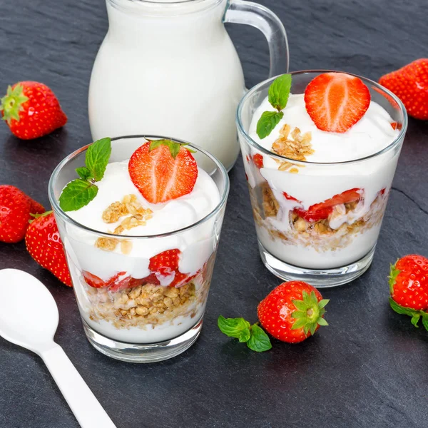 Strawberry yogurt yoghurt strawberries fruits glass square muesl — Stock Photo, Image