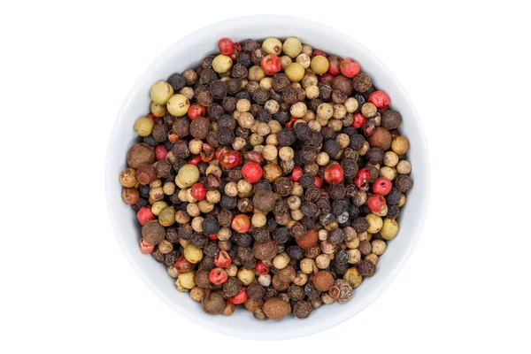 Peppercorns pepper peppercorn from above bowl isolated on white — Stock Photo, Image