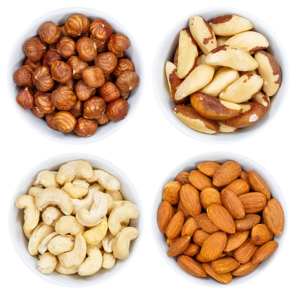 Nuts nut collection from above bowl isolated on white — Stock Photo, Image