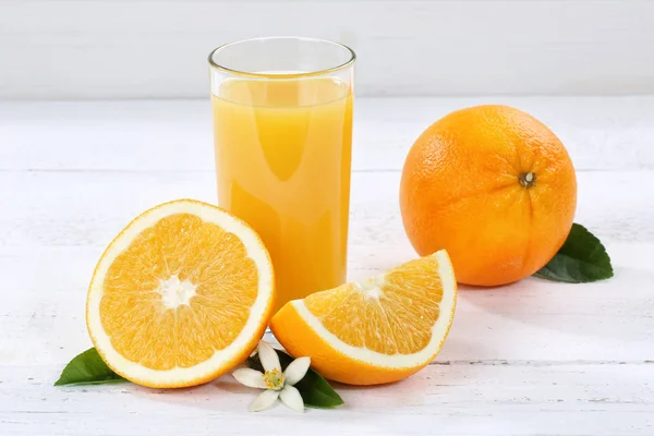 Jugo de naranja naranjas vidrio frutas —  Fotos de Stock