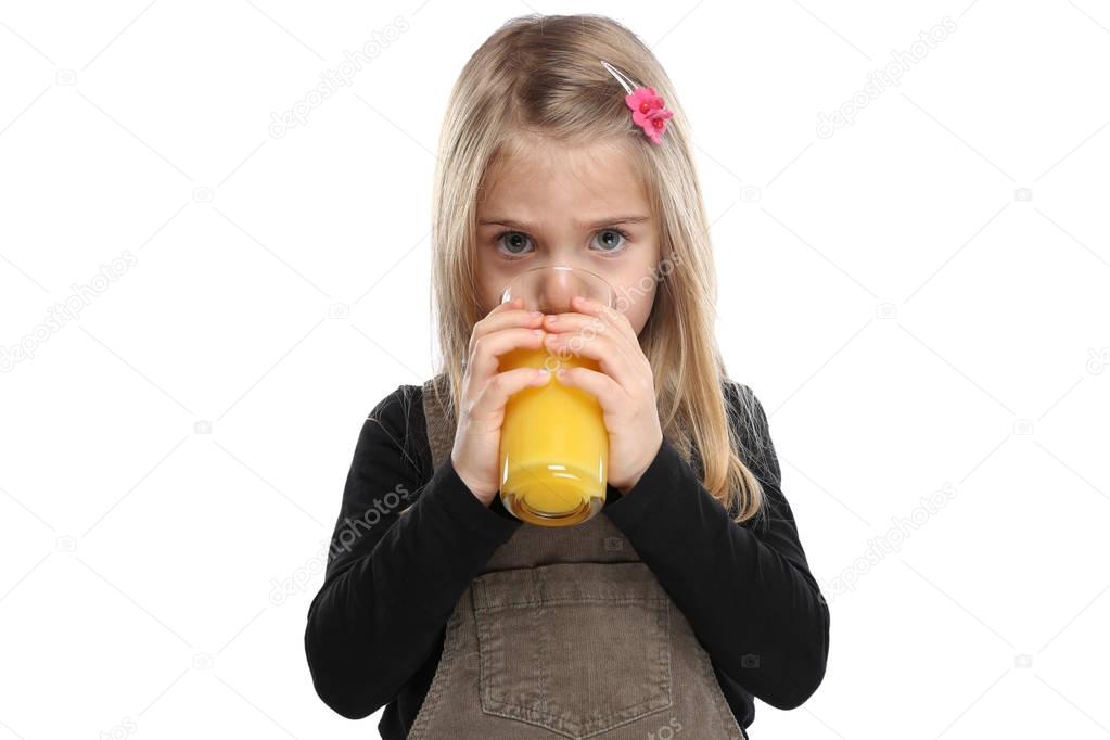 Child girl kid drinking orange juice healthy eating isolated on 