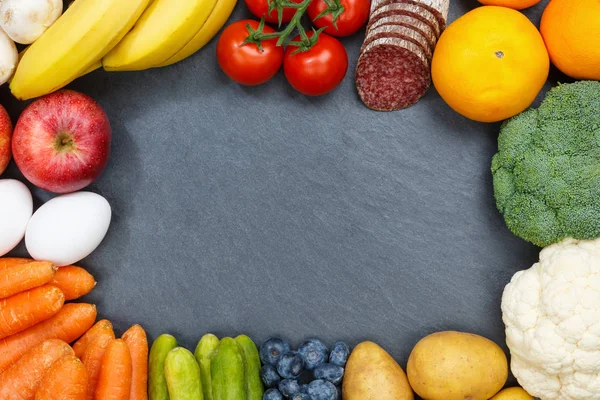 Groenten en fruit eten collectie frame leisteen copyspace uit — Stockfoto