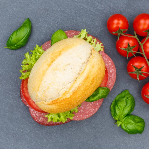 Sandwich baguette med salami skinka fyrkantig ovanifrån skiffer — Stockfoto