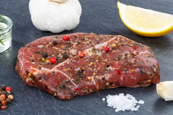 Meat raw beef steak on slate — Stock Photo, Image