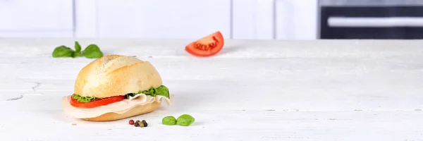 Sandwich baguette with ham copyspace banner on wooden board — Stock Photo, Image