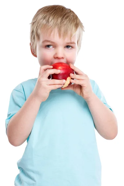 Child kid eating apple fruit autumn fall healthy portrait format — Stock Photo, Image