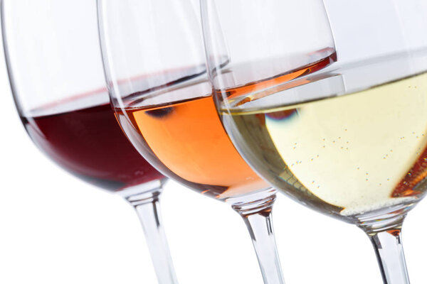 Wine glasses red rose isolated on white