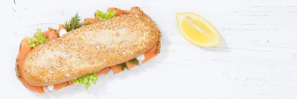 Sub sandwich whole grain grains baguette with salmon fish banner — Stock Photo, Image