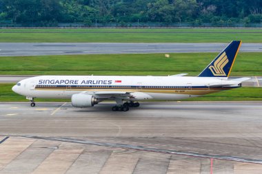 Changi, Singapur 29 Ocak 2018 Singapur Havayolları Boeing 777-200ER uçağı Singapur 'da Changi havaalanında (SIN). Boeing, merkezi Chicago 'da bulunan bir Amerikan uçak üreticisi..