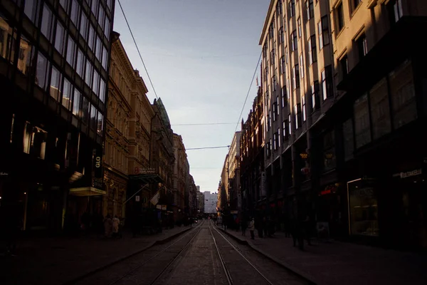 Cityscape with hard shadows before sunset
