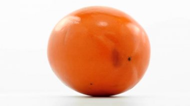 Turuncu olgun kaki döner