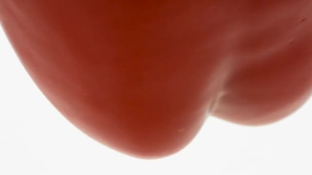 Красный перец взвешенный в воздухе — стоковое видео