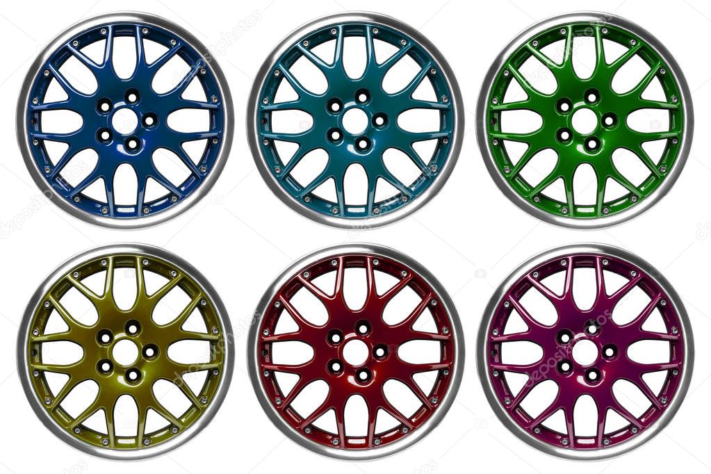 Colorful alloy rims floating in the air at grey background