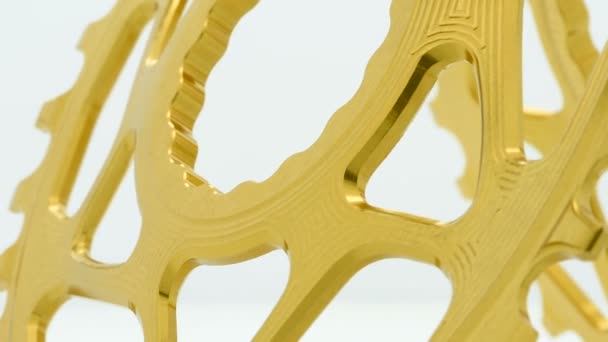 Gouden Ovale Fiets Kettingblad Versnelling Draaien Witte Achtergrond Sterke Dicht — Stockvideo