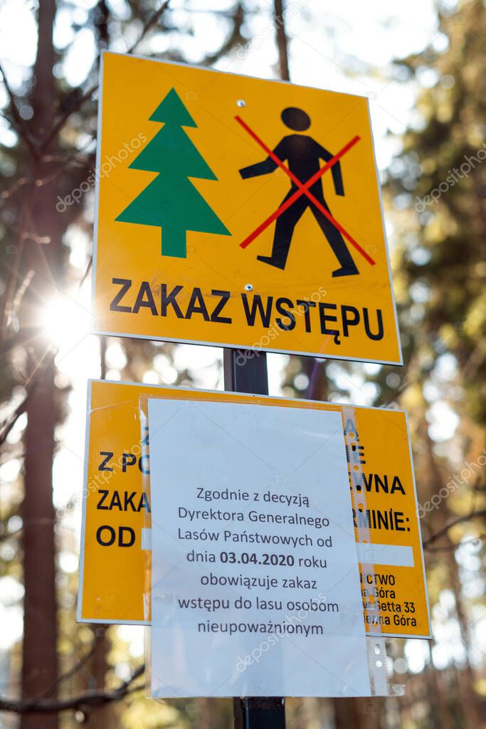 Return of communism in Poland. Information plate with a sign prohibiting entry into the forest. The ban does not comply with the Polish constitution.  PIS violates human rights during the coronavirus epidemic.
