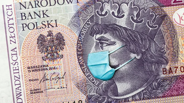 폴란드의 코로나 바이러스 세계적 경기후퇴 폴란드저러티 지폐에 감염에 마스크가 폴란드의 스톡 사진