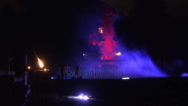 Old mill illuminated laser light smoke at night laser show. 4K — Stock Video
