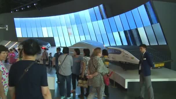 Automobile car prototype using solar sun panel energy and tourist people in Expo — Stock Video