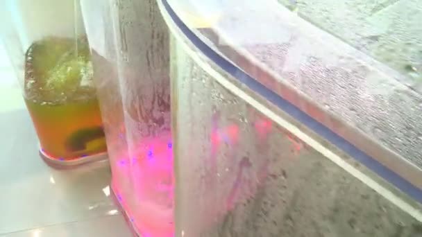 Bio fuel generating process. liquid in transparent reservoir. — Stock Video