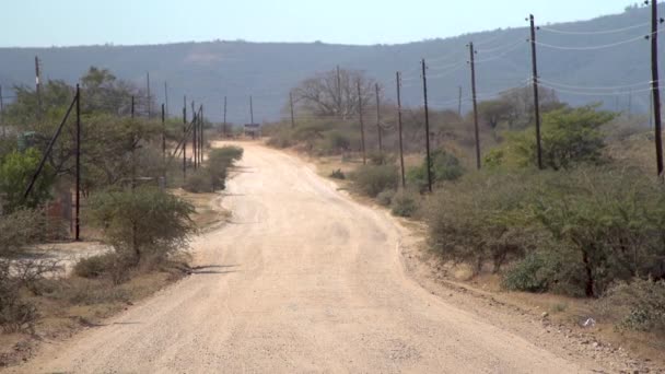 Estrada Longa Sujeira Paisagem Africana Seca — Vídeo de Stock