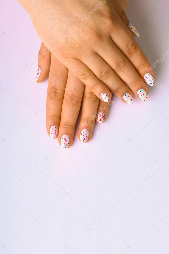 Manicure with painted dots