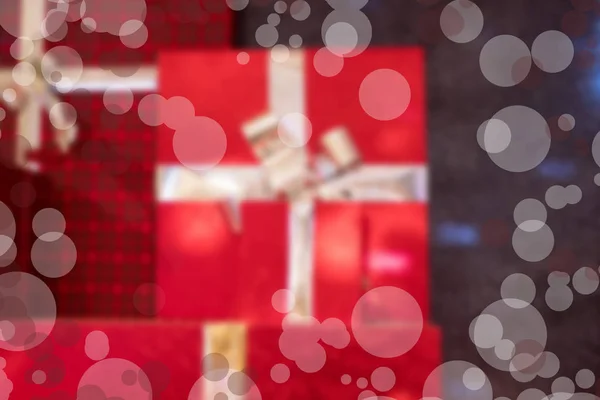Abstraktní rozmazání. Vánoční sváteční kompozice s dárkovými krabicemi. — Stock fotografie