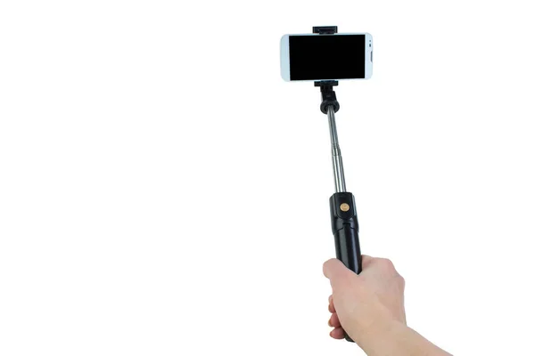 Selfie machen - Einbeinstativ mit Handy halten. — Stockfoto