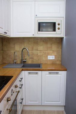 Kitchen in a Scandinavian style . Modern kitchen. Light solid wood Furniture. Interior. The kitchen room . Shelves. Russia, Saint Petersburg 29 February 2020