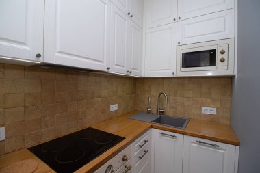 Kitchen in a Scandinavian style . Modern kitchen. Light solid wood Furniture. Interior. The kitchen room . Shelves. Russia, Saint Petersburg 29 February 2020