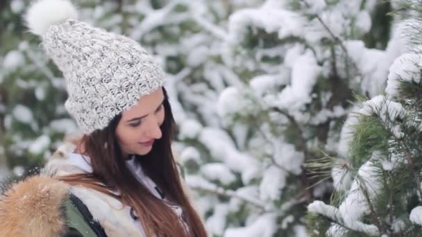 Girl in snowy forest — Stock Video