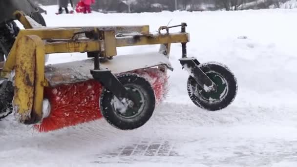 Tractor cleaning snow snowthrower — Stock Video