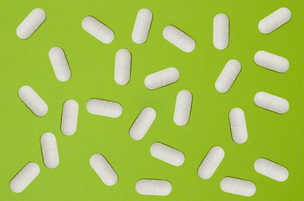 Pattern Many White Pills Green Background — Stock Photo, Image