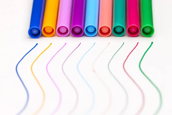 Lines leading to the caps of markers. — Stock Photo, Image