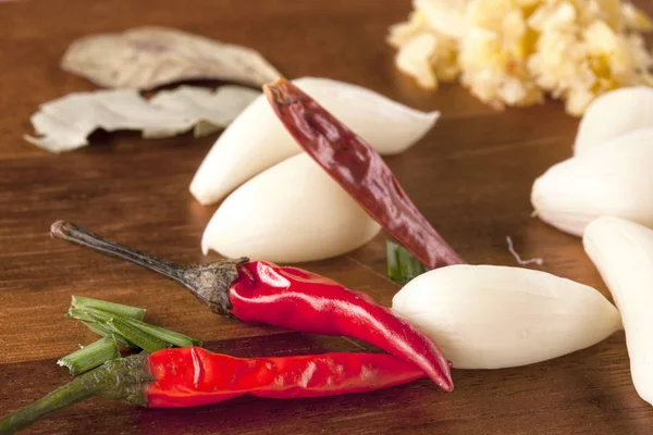 Close up of peppers and garlic. — Stock Photo, Image