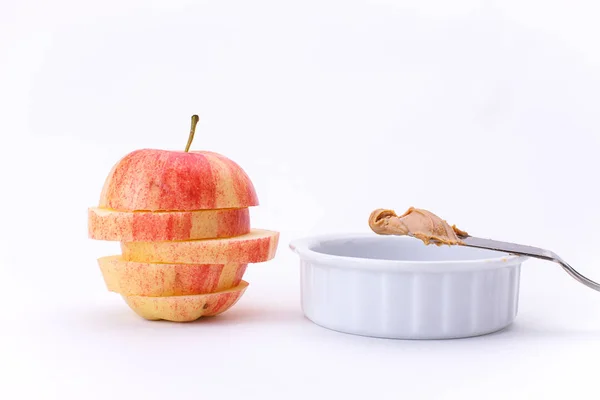 Manzana en rodajas y mantequilla de maní . —  Fotos de Stock