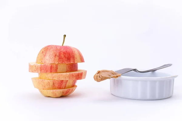 Manzana en rodajas y mantequilla de maní . —  Fotos de Stock