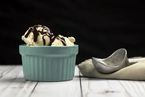 Scoops Vanilla Ice Cream Bowl Smothered Chocolate Syrup — Stock Photo, Image