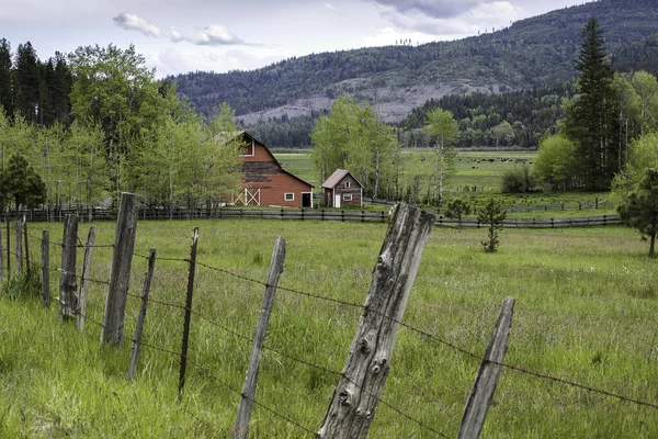 Old Fence Leads Red Barn North Idaho — Stock Photo, Image